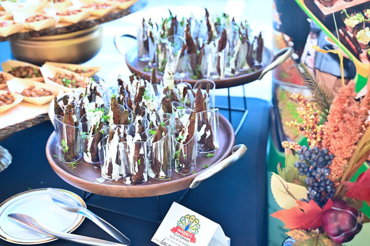 Canape and dessert display on a Mayuri catering table